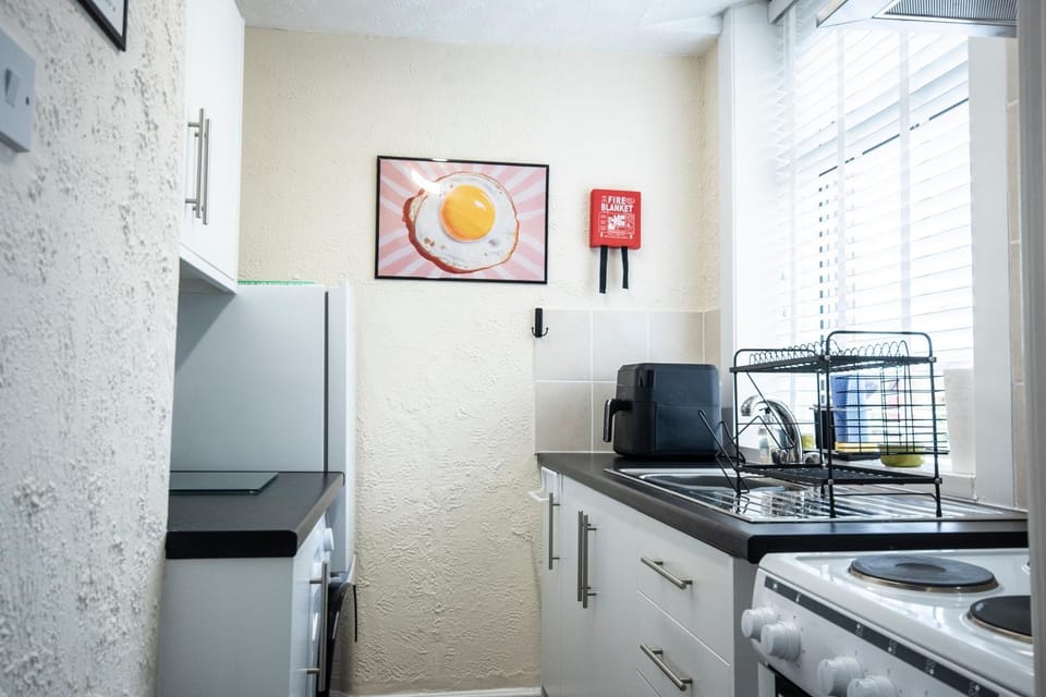 Kitchen or kitchenette, oven, stove, toaster