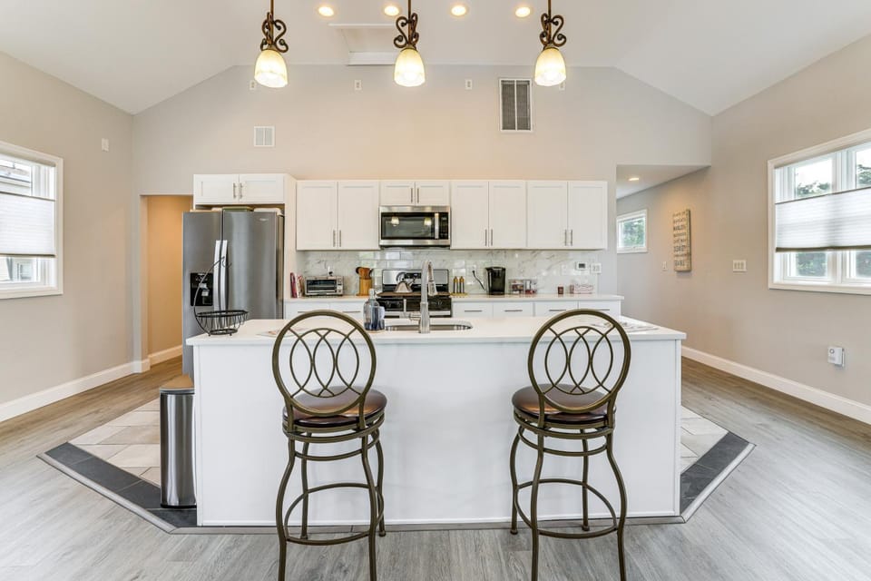 Dock + Backyard Bar: Spacious Barnegat Bay Retreat House in Jersey Shore