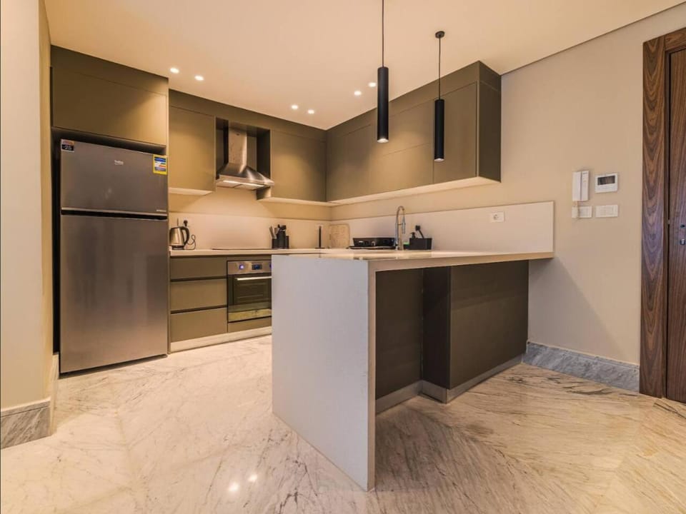 Kitchen or kitchenette, oven, stove