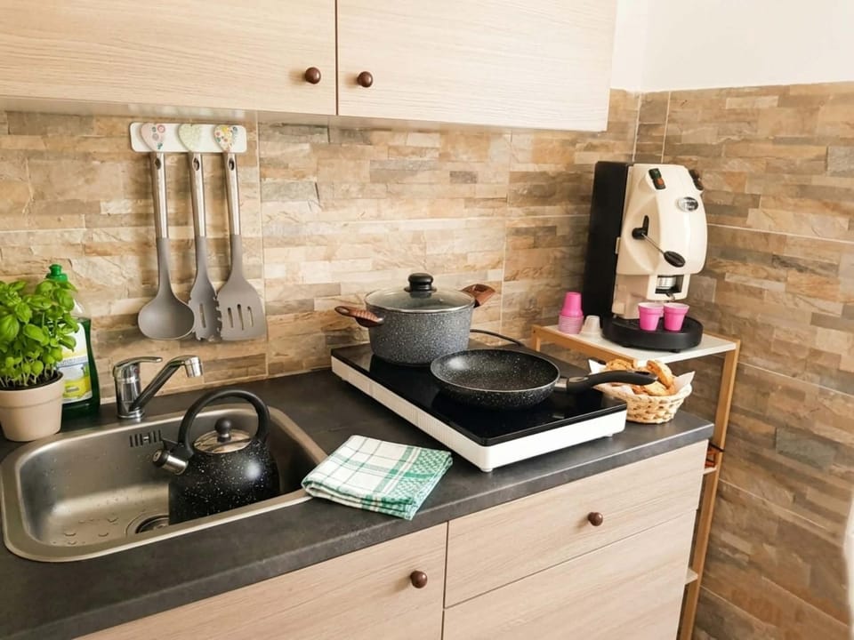 Kitchen or kitchenette, stove
