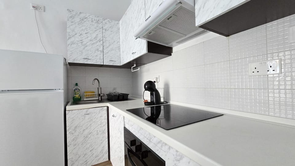Kitchen or kitchenette, oven