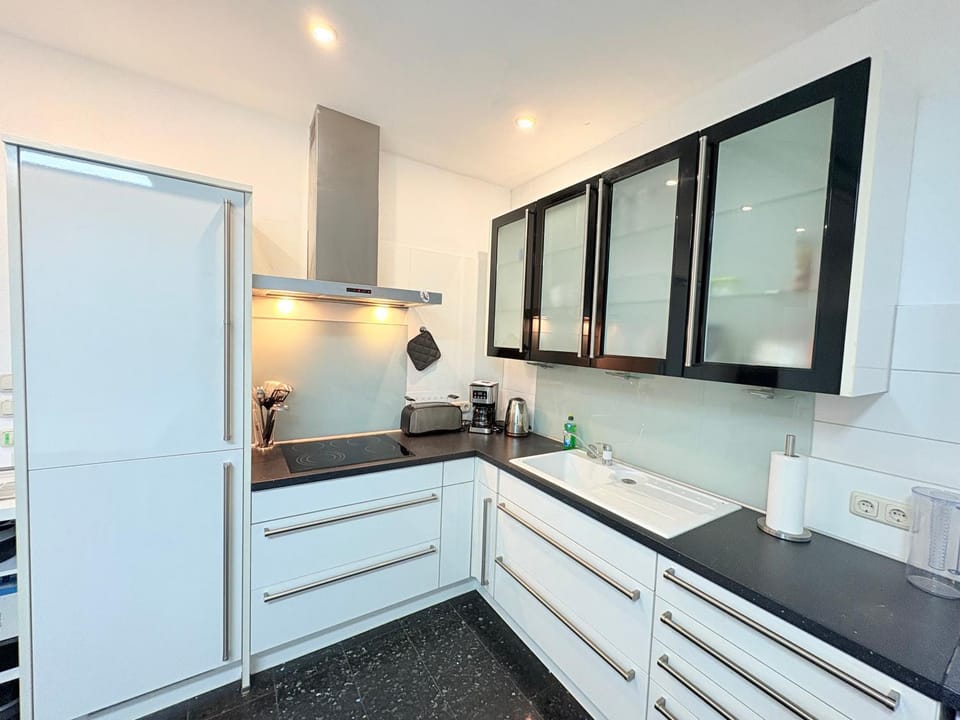 Kitchen or kitchenette, stove