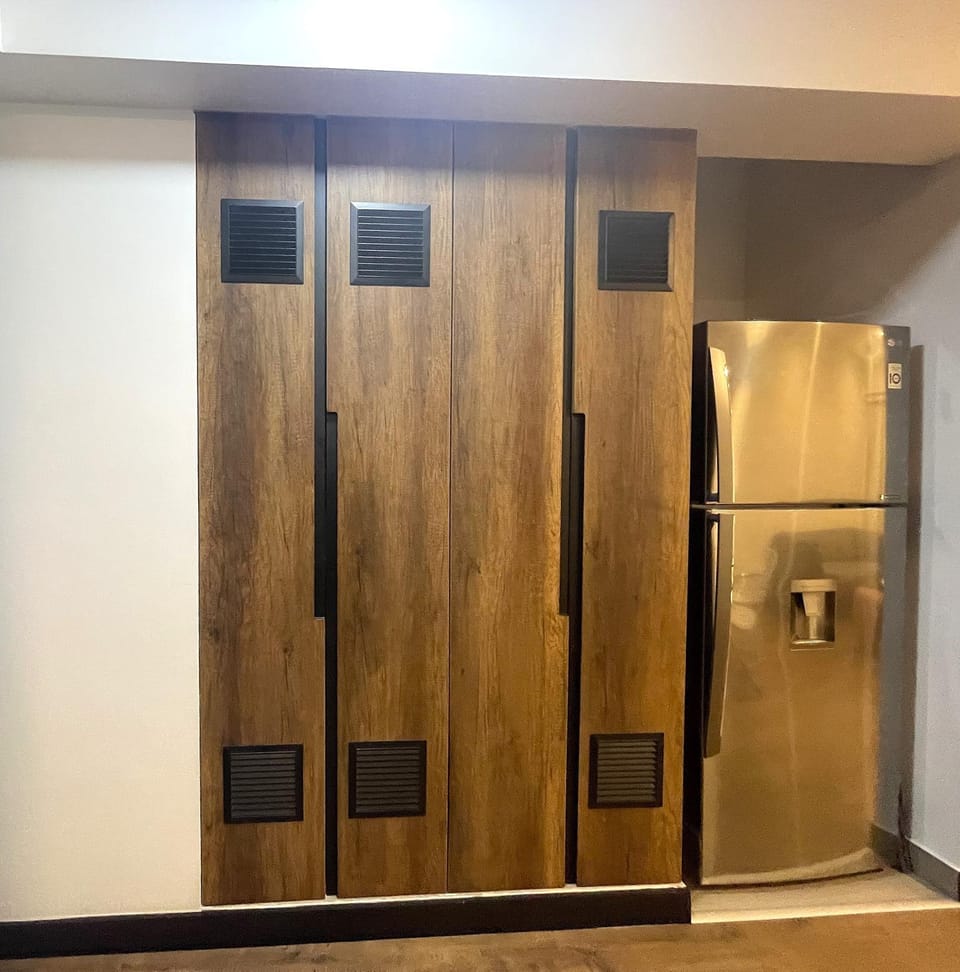 Kitchen or kitchenette, laundry, washing machine, dryer