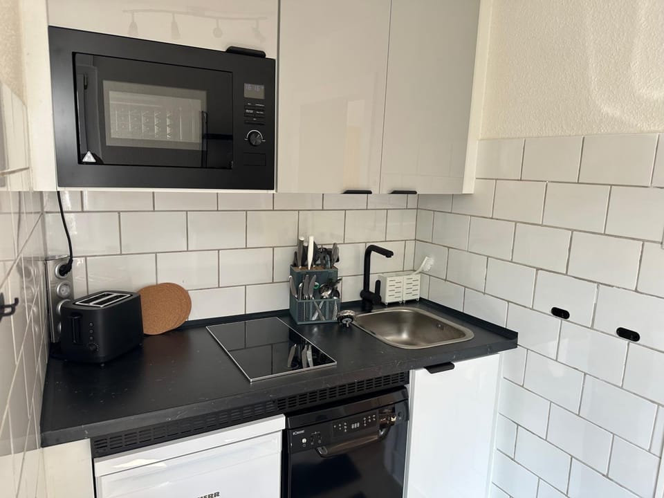 Kitchen or kitchenette, stove