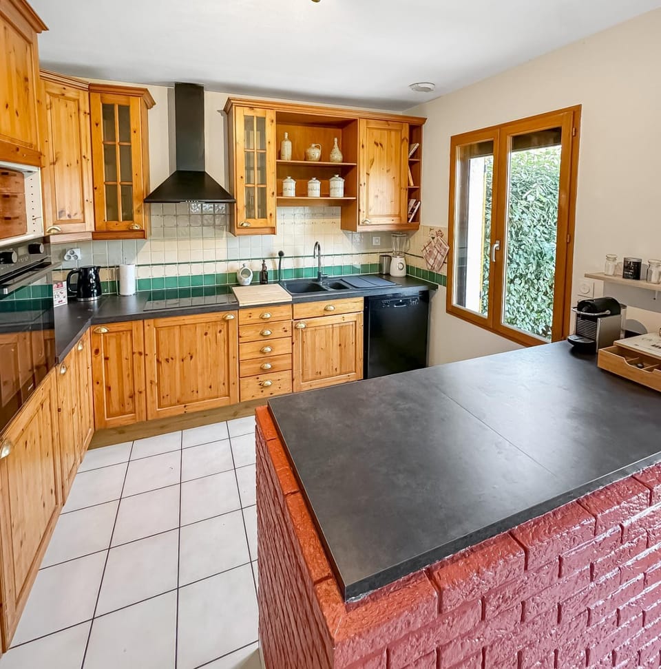 Kitchen or kitchenette, dishwasher, oven, stove