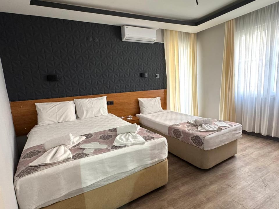 Bed, Photo of the whole room, Bedroom, towels, air conditioner