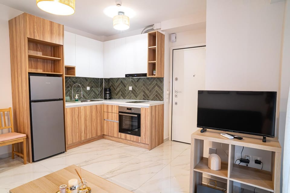 TV and multimedia, Kitchen or kitchenette, Living room, Photo of the whole room, Decorative detail, oven, stove, kitchen