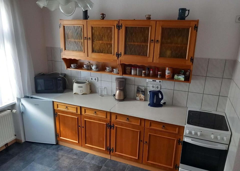 Kitchen or kitchenette, stove