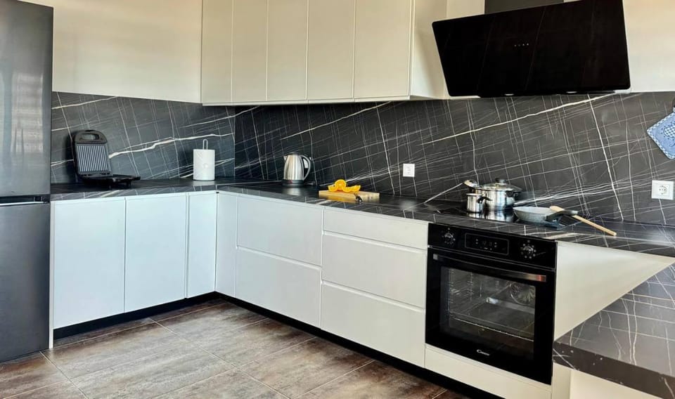 Kitchen or kitchenette, stove