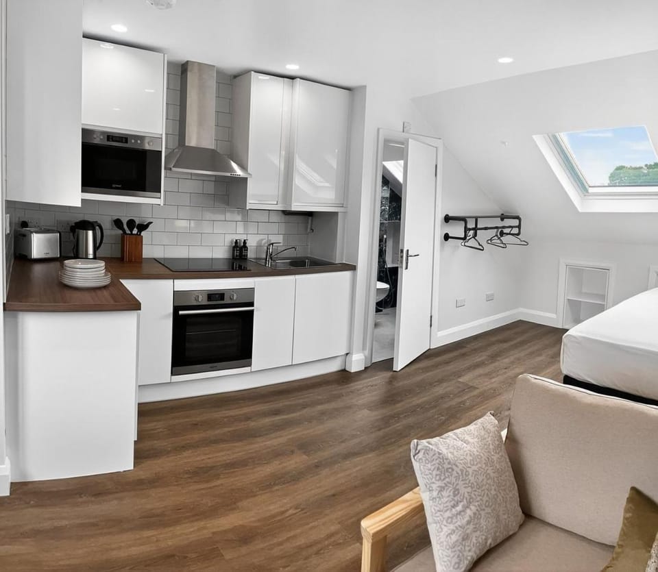 Kitchen or kitchenette, microwave, oven, stove, toaster