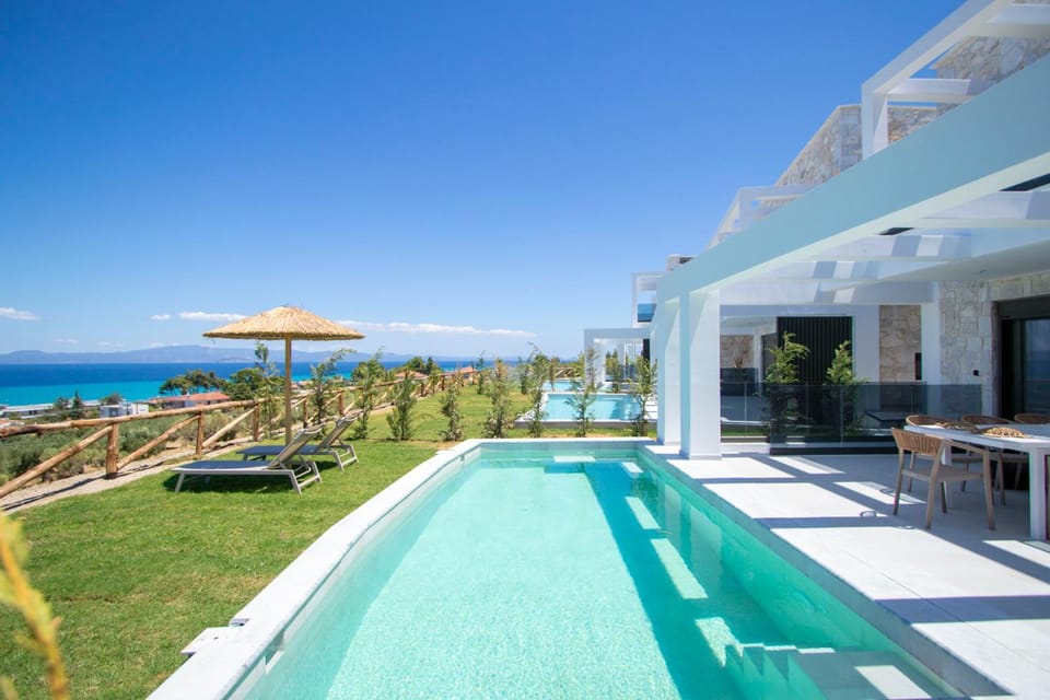 Property building, Patio, Day, Natural landscape, View (from property/room), Balcony/Terrace, Pool view, Sea view, Swimming pool, sunbed