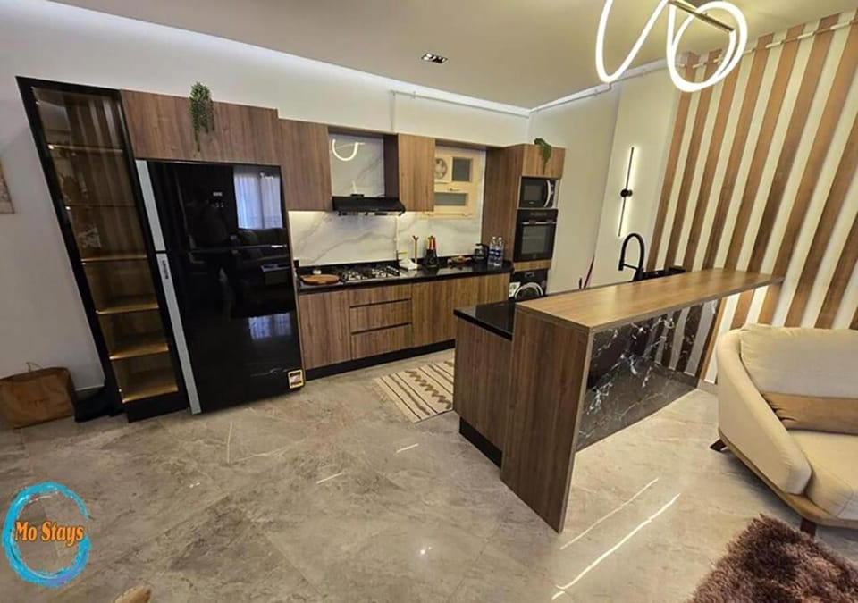 Kitchen or kitchenette, oven, stove