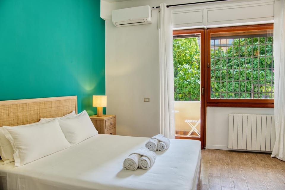 Bed, Photo of the whole room, Bedroom, towels, air conditioner