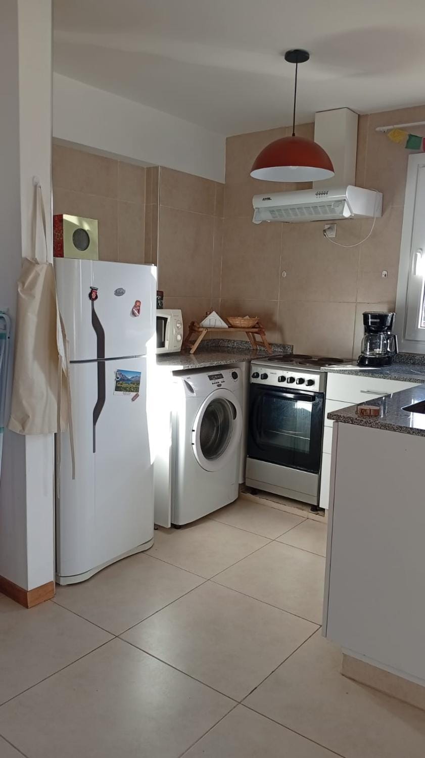 Kitchen or kitchenette, washing machine