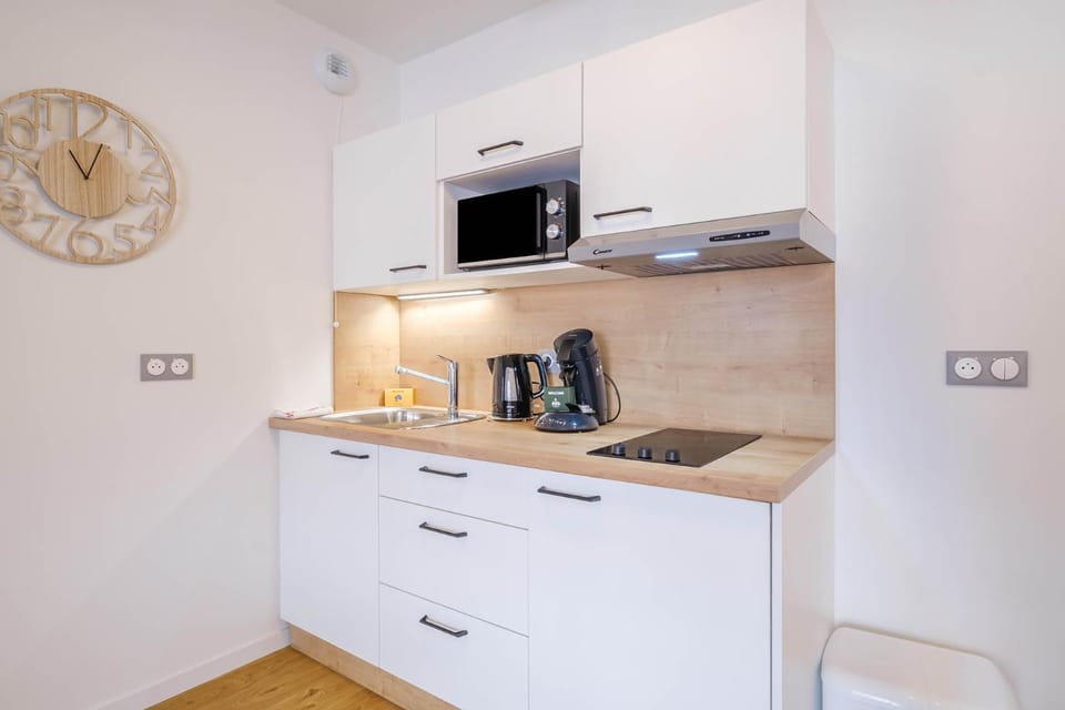 Kitchen or kitchenette, stove