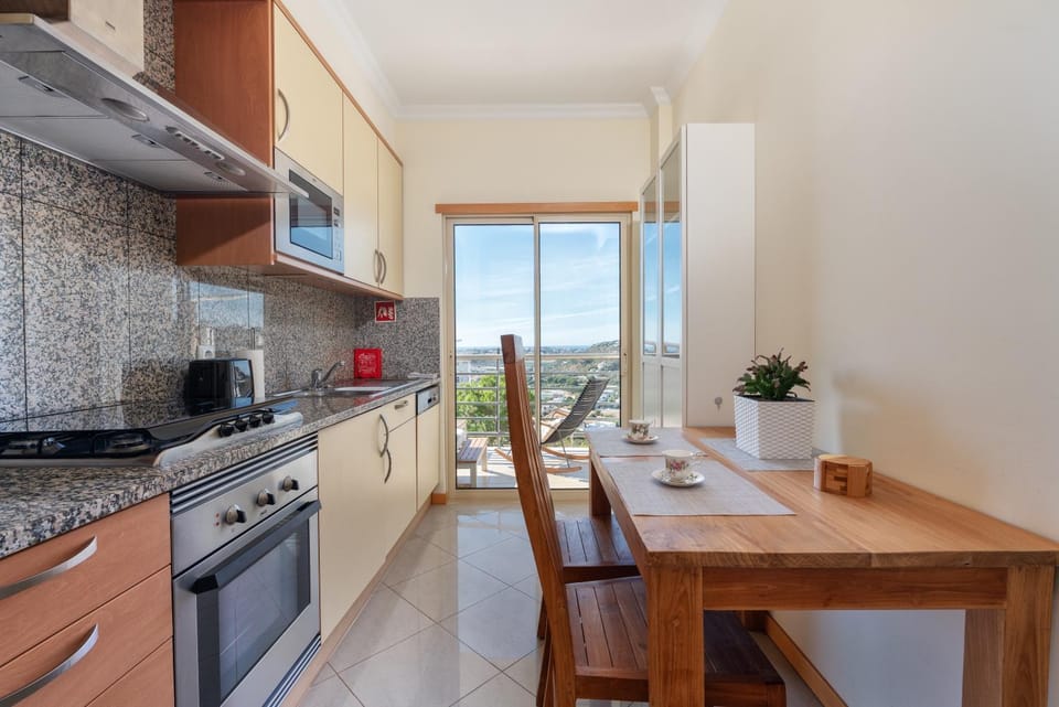 Kitchen or kitchenette, Dining area, dishwasher, oven, stove, toaster