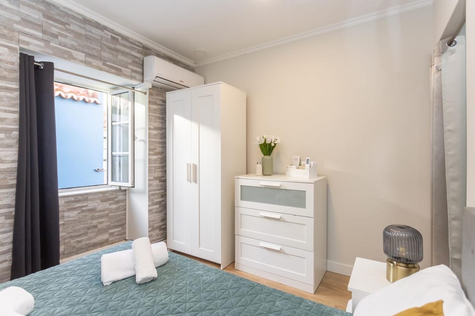 Bed, Photo of the whole room, Bedroom, furniture, towels, wardrobe, air conditioner