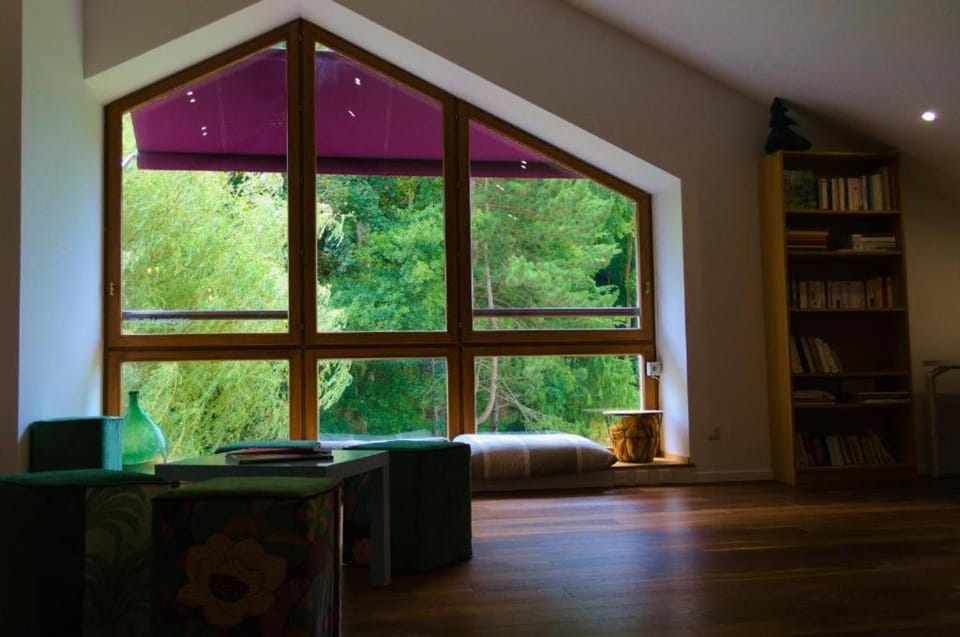 Library, Living room, Seating area, Garden view