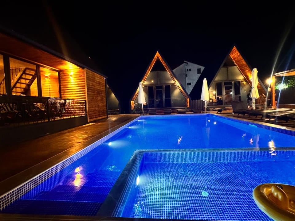 Night, Lounge or bar, Pool view, Swimming pool, Swimming pool, sunbed