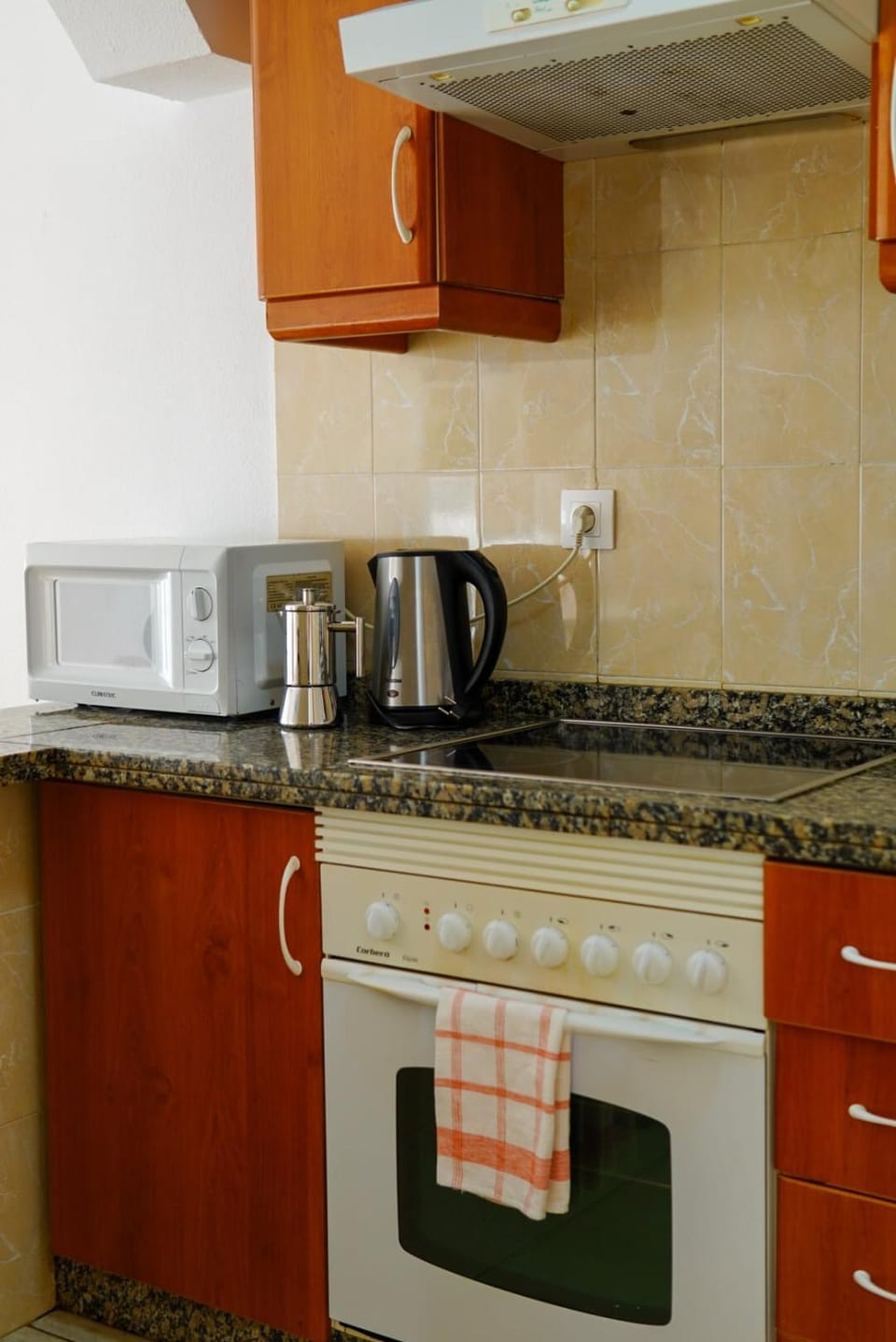 Kitchen or kitchenette, stove
