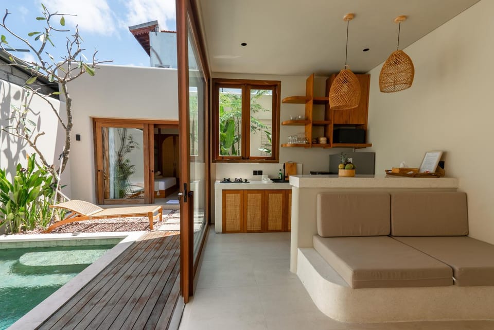 Kitchen or kitchenette, Living room, Seating area, Pool view, microwave, stove
