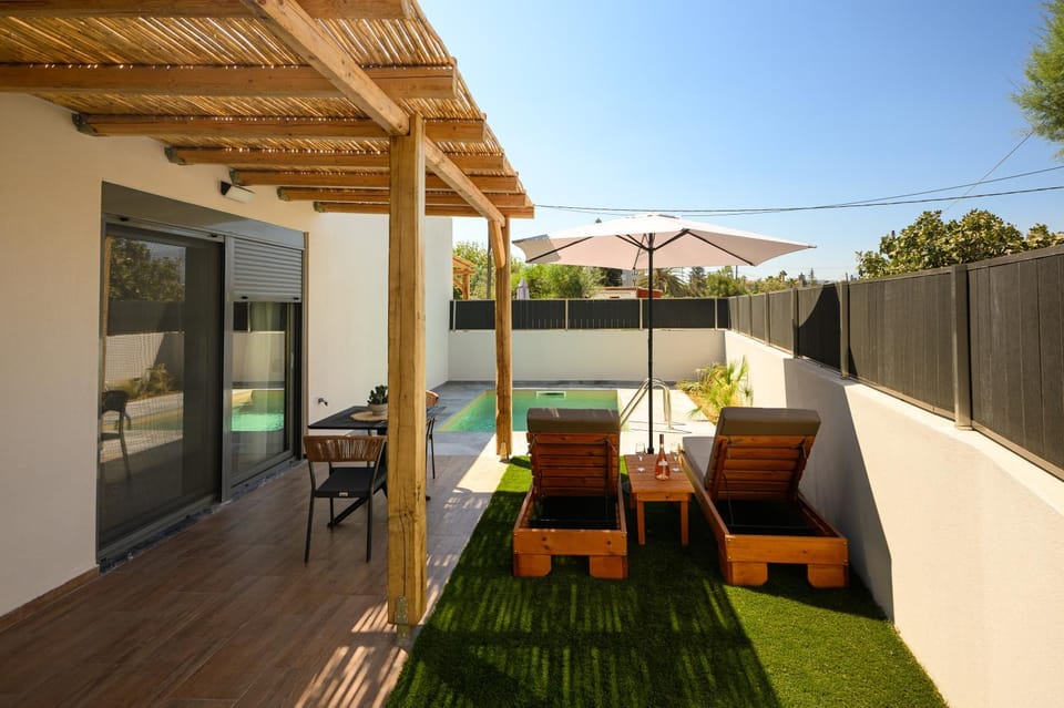 Patio, Day, Garden, Pool view, Swimming pool, sunbed