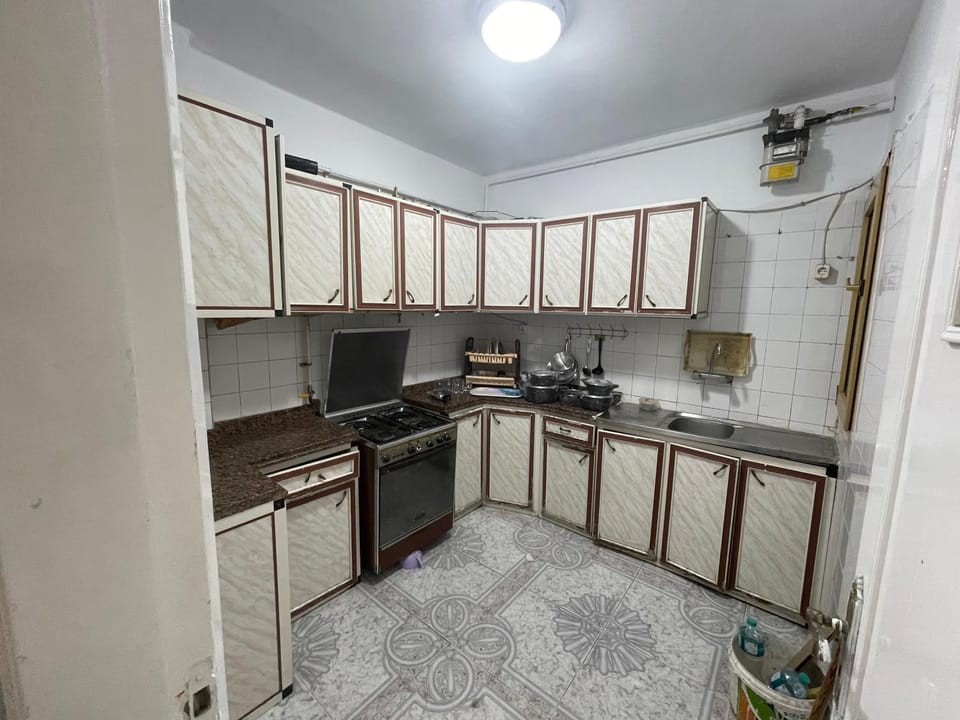 Kitchen or kitchenette, oven, stove