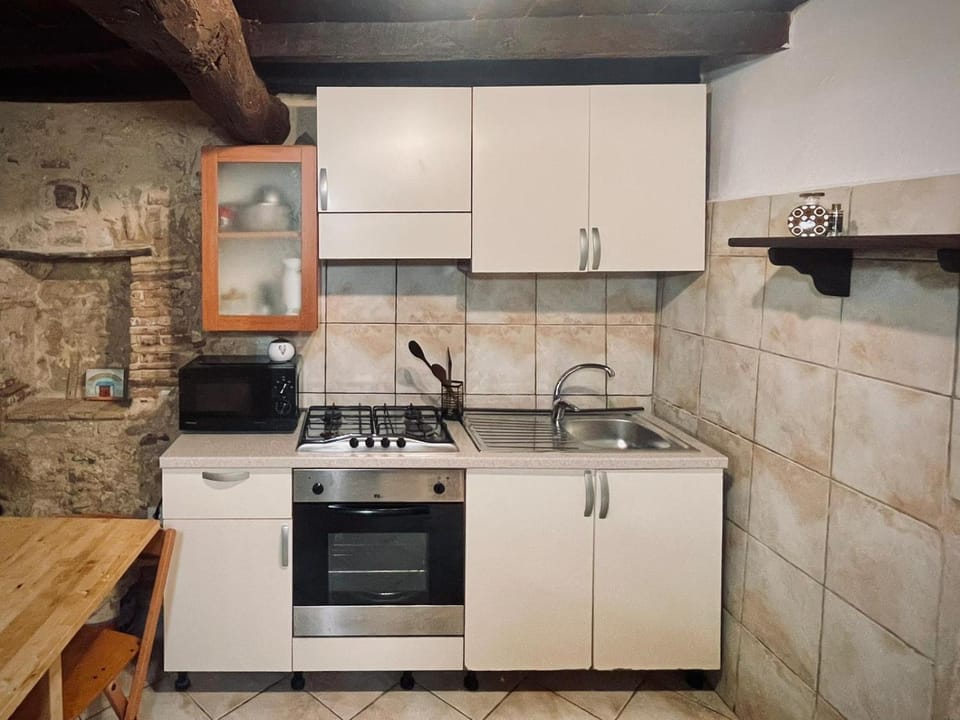 Kitchen or kitchenette, stove