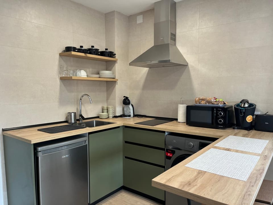 Kitchen or kitchenette, stove