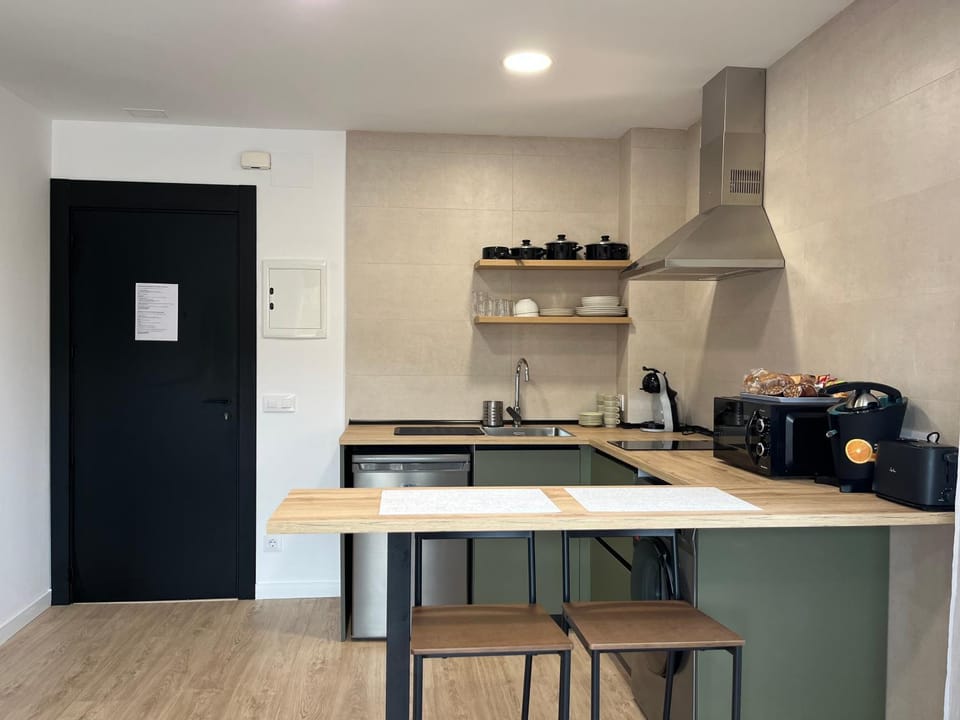 Kitchen or kitchenette, stove, toaster