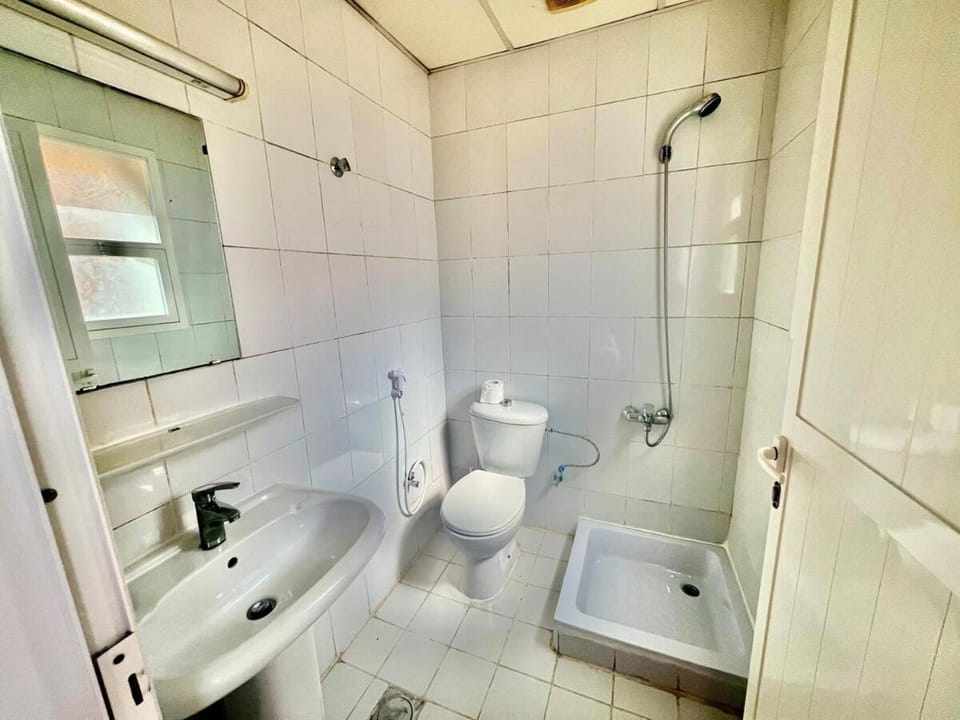 Close to the airport Near Abu Baker metro station Apartment in Dubai