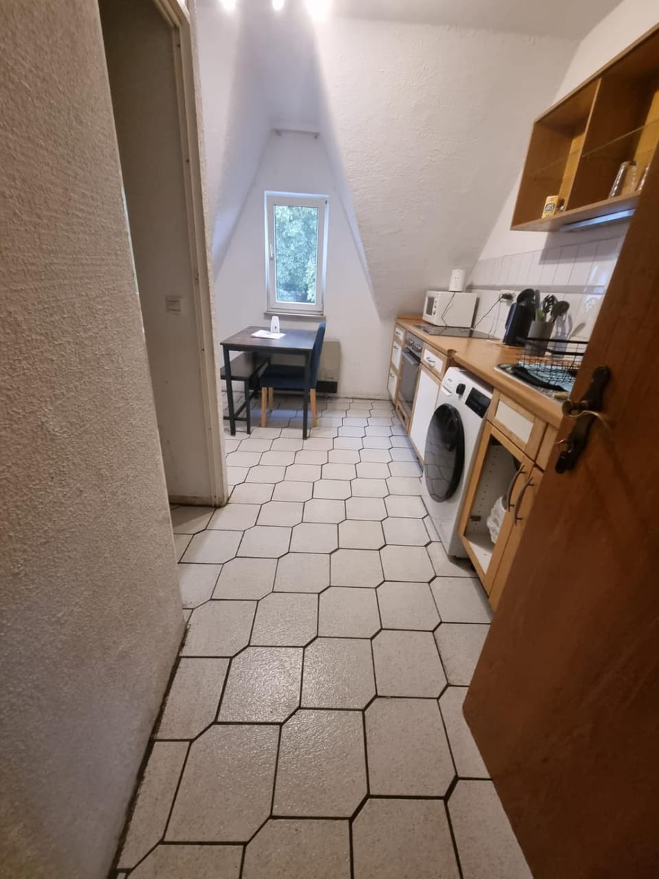 Kitchen or kitchenette, Dining area, oven, stove, washing machine, dryer