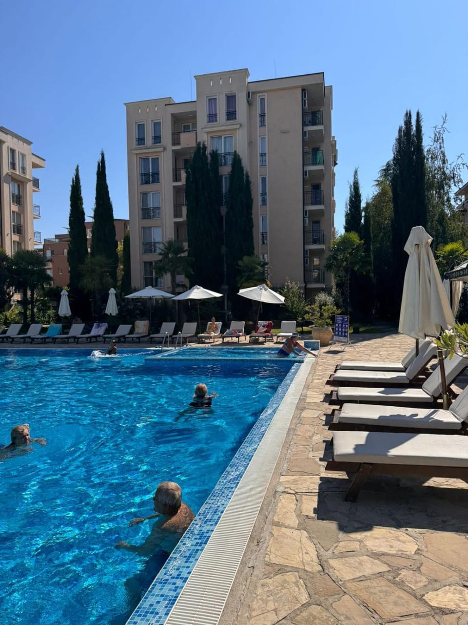 Property building, Swimming pool, sunbed
