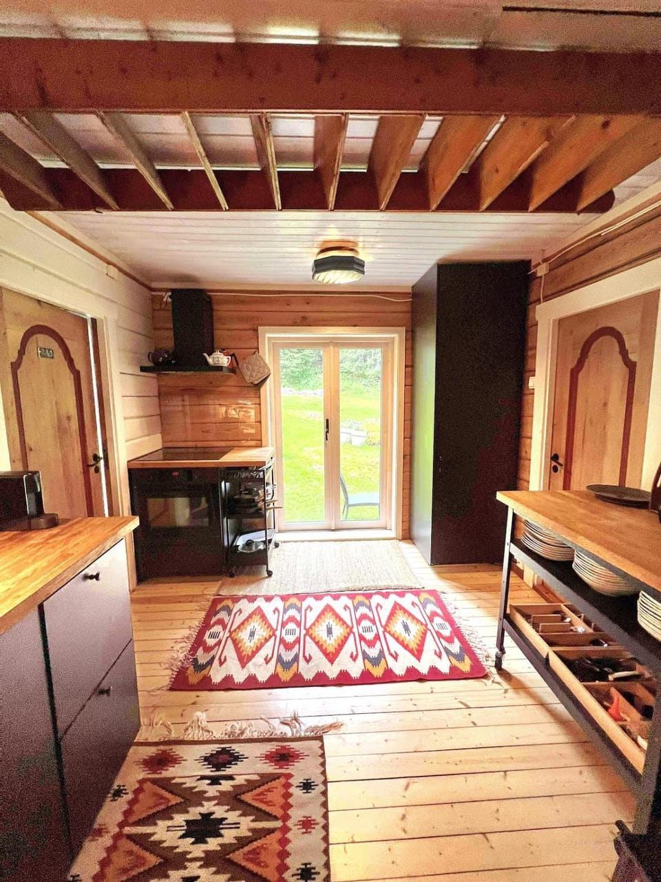 Kitchen or kitchenette, dishwasher, oven, stove