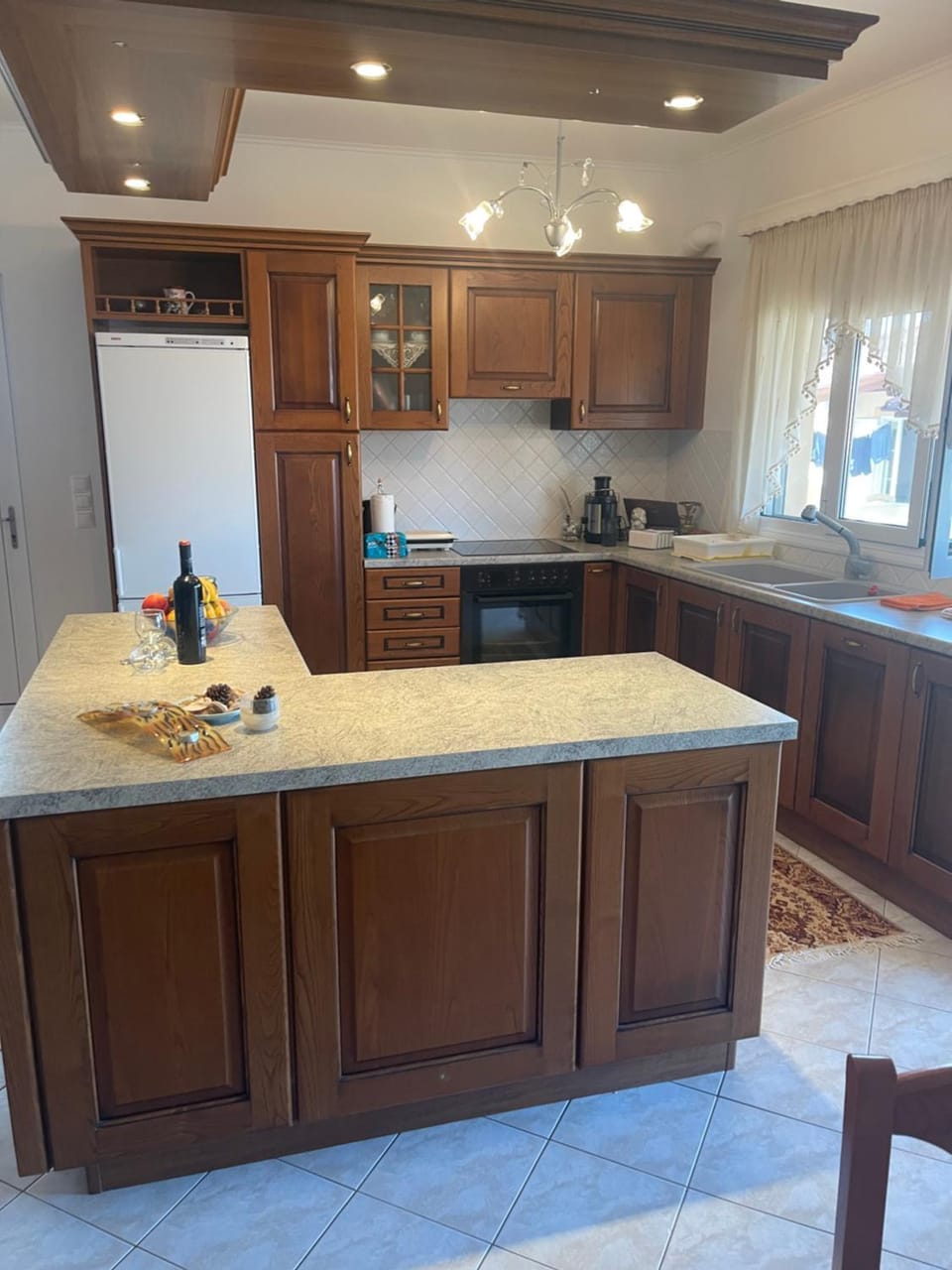 Kitchen or kitchenette, dishwasher, oven, stove