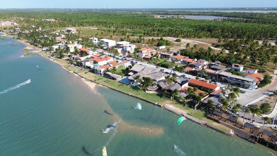 Property building, Nearby landmark, Day, Natural landscape, Bird's eye view, Beach, Windsurfing, City view, Sea view, Sports