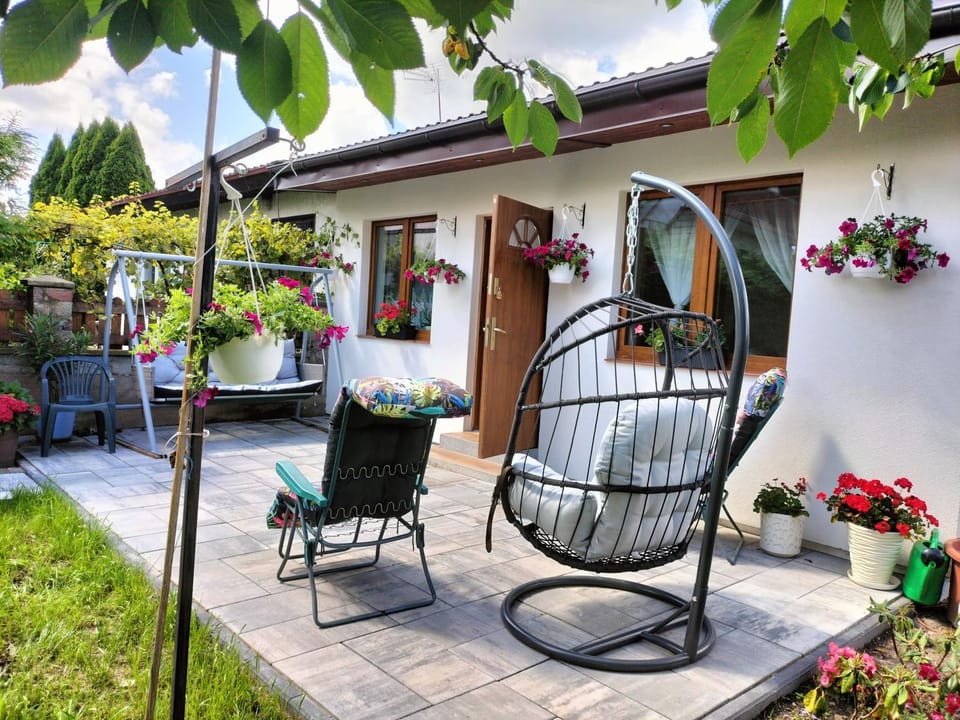 Property building, Living room, Seating area, Garden view