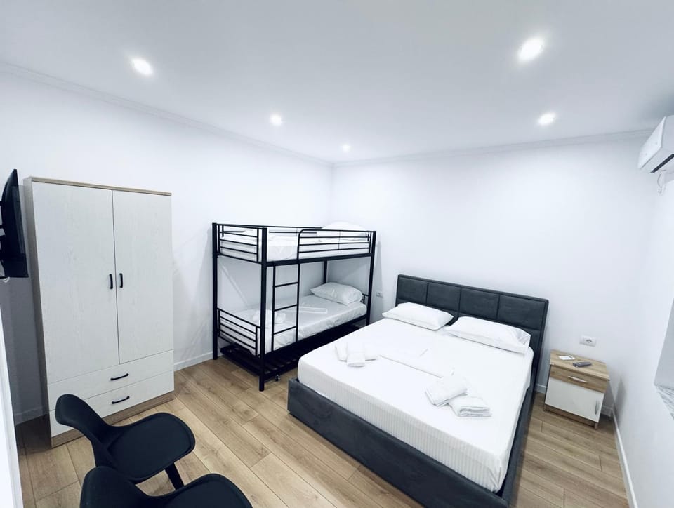 Bed, Photo of the whole room, Bedroom, bunk bed, towels, wardrobe, air conditioner