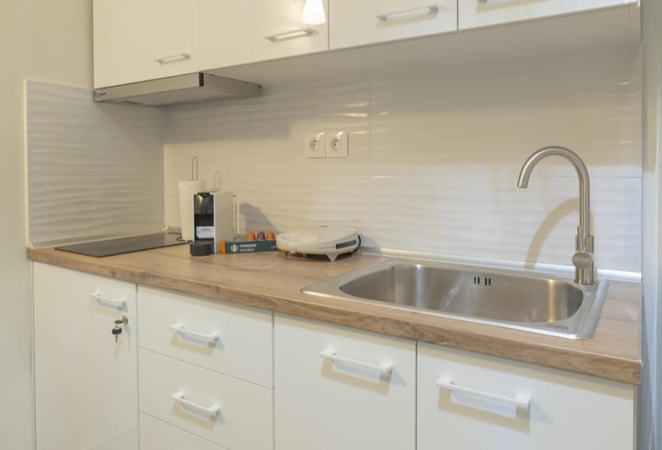 Kitchen or kitchenette, stove