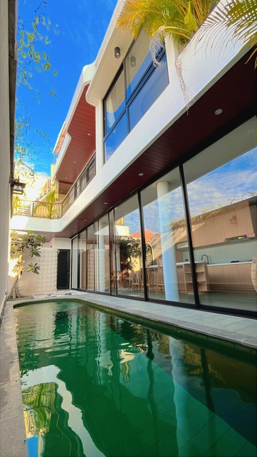 Property building, Patio, Day, Pool view, Swimming pool
