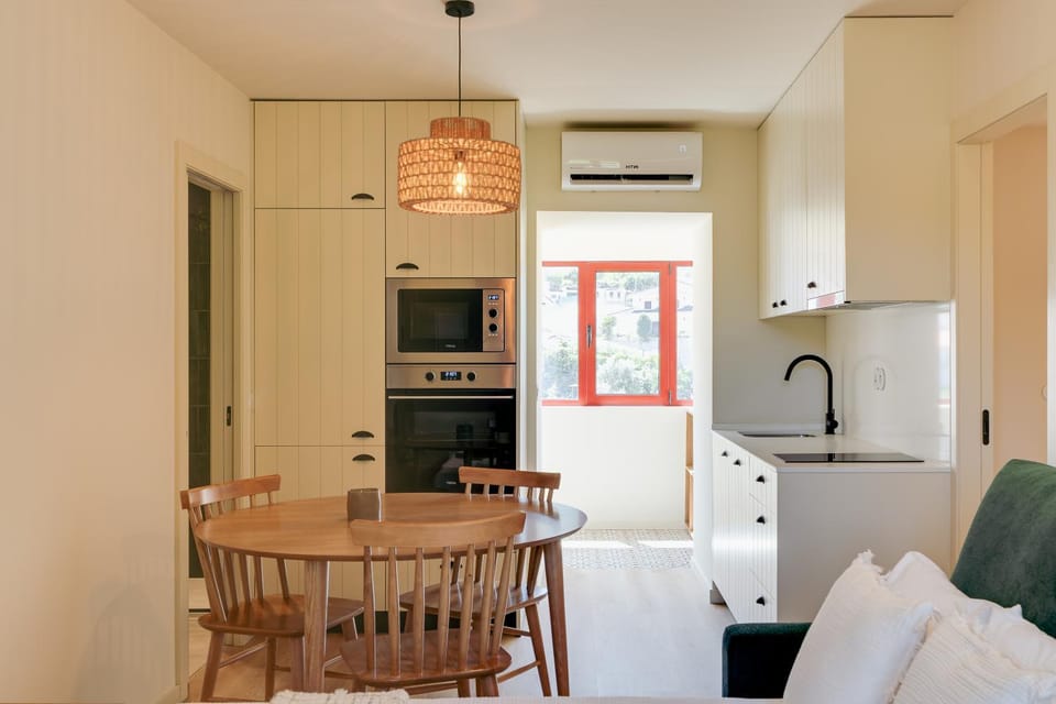 Kitchen or kitchenette, Living room, Dining area, oven, stove, air conditioner