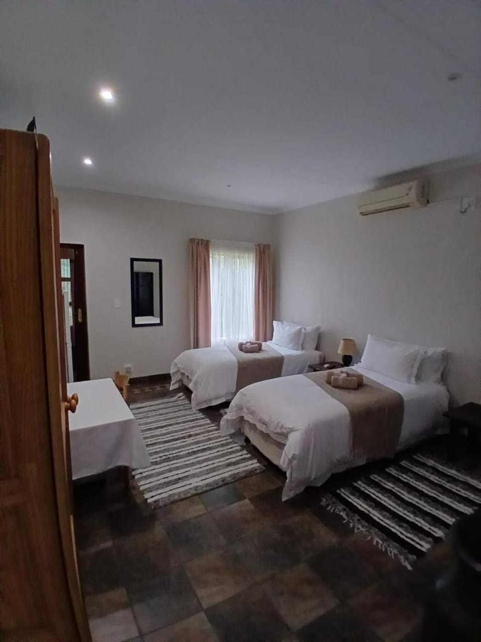 Bed, Photo of the whole room, Bedroom, towels, air conditioner