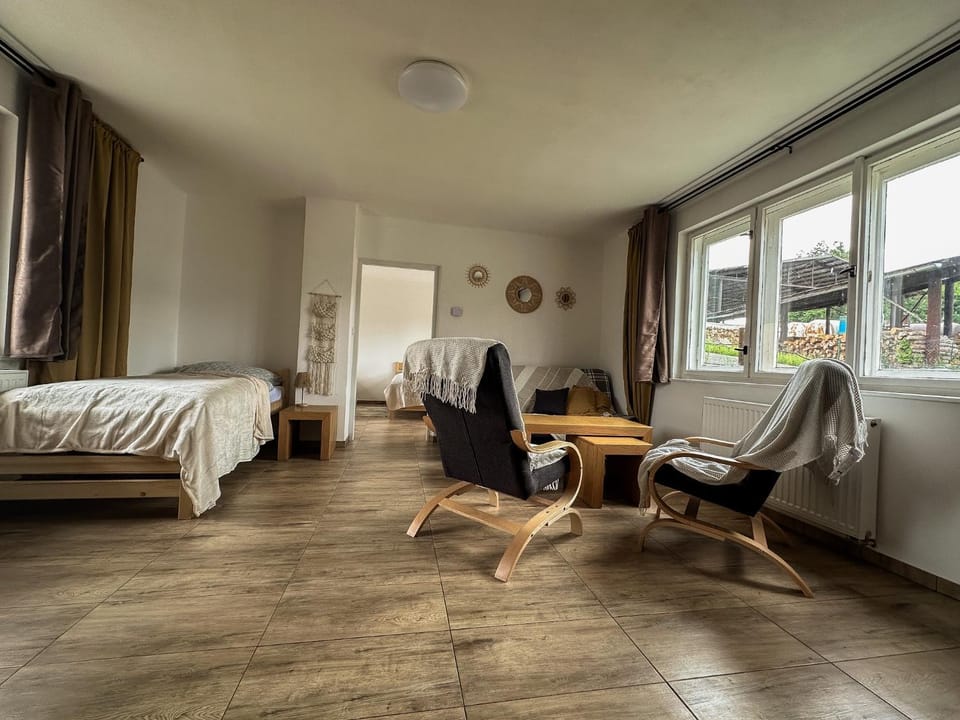 Bed, Living room, Seating area, Bedroom
