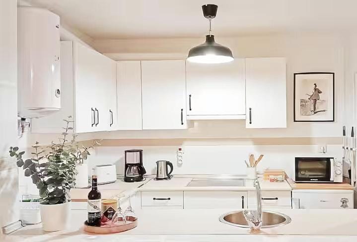 Kitchen or kitchenette, stove, toaster