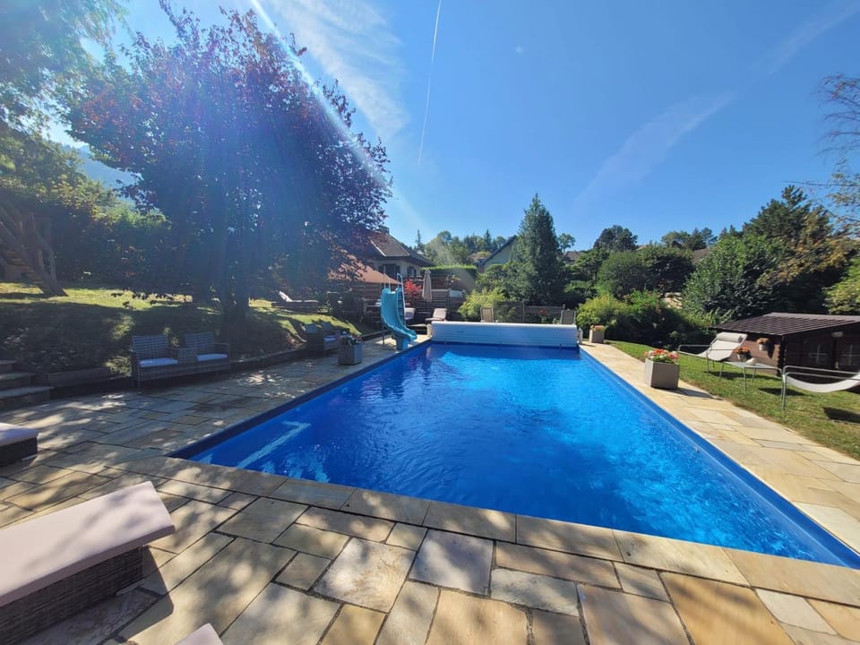 Swimming pool, sunbed