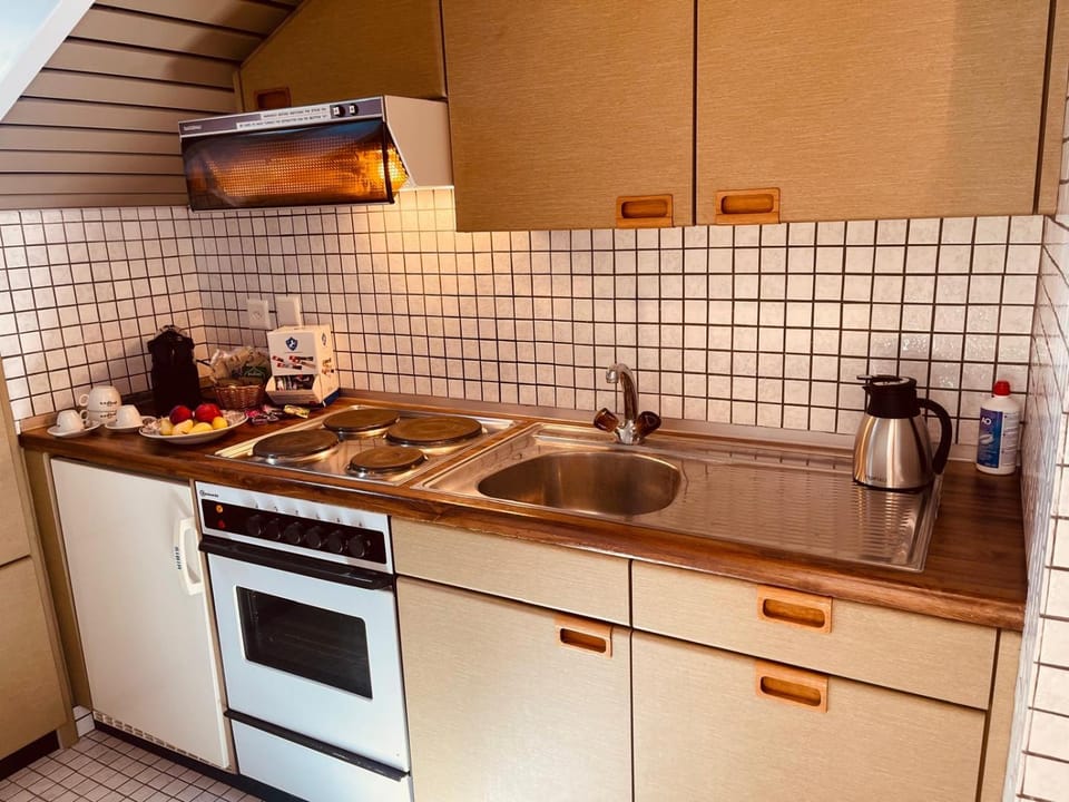 Kitchen or kitchenette, stove