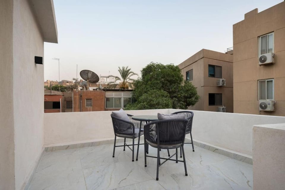 Property building, Day, View (from property/room), Balcony/Terrace, Living room, Seating area