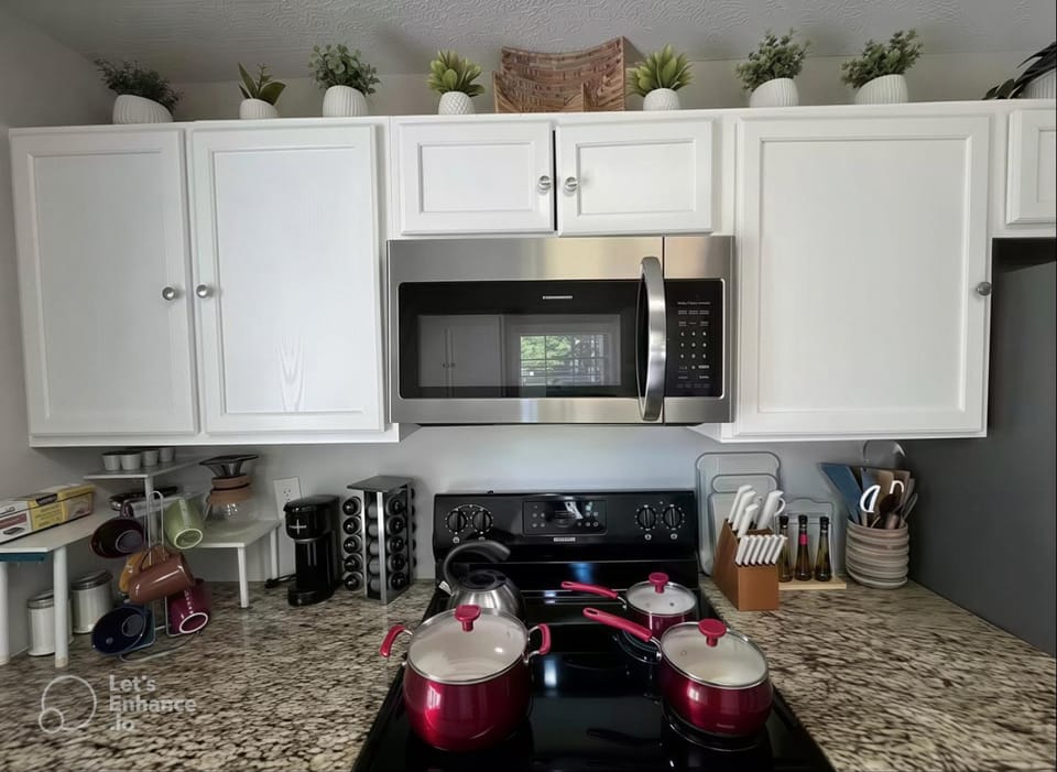 Kitchen or kitchenette, dishwasher, oven, stove