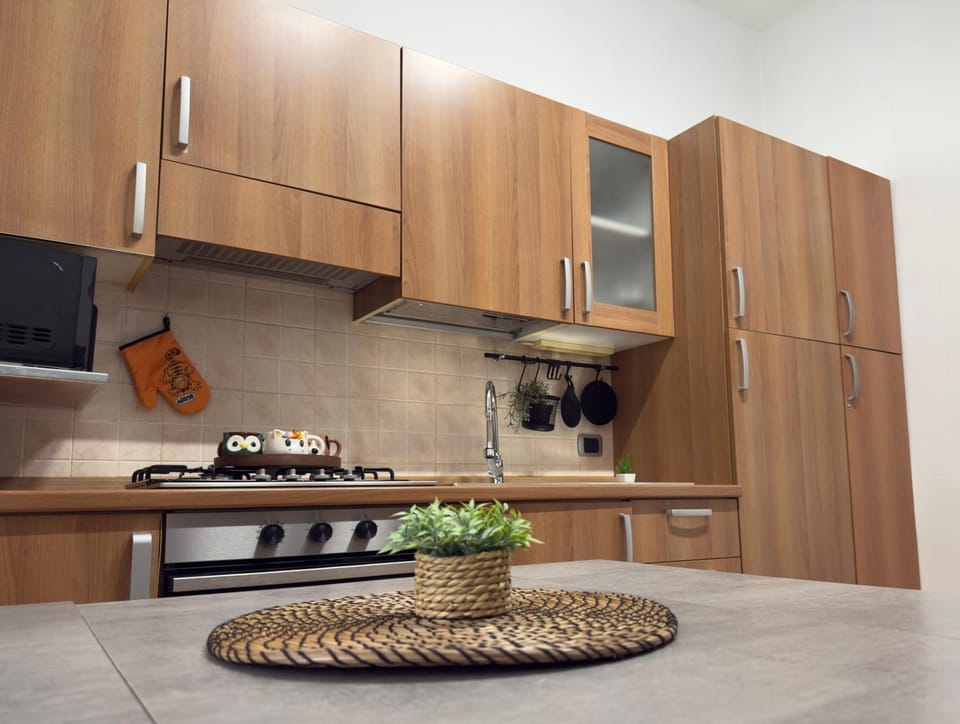 Kitchen or kitchenette, Living room, stove
