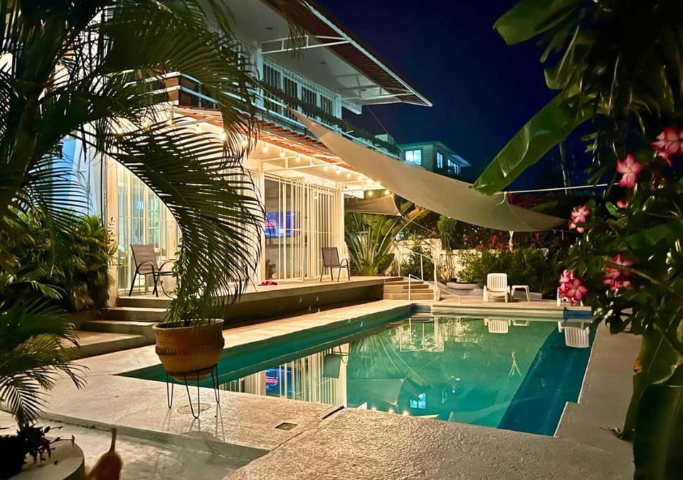 Property building, Patio, Night, Garden view, Pool view, Swimming pool, sunbed